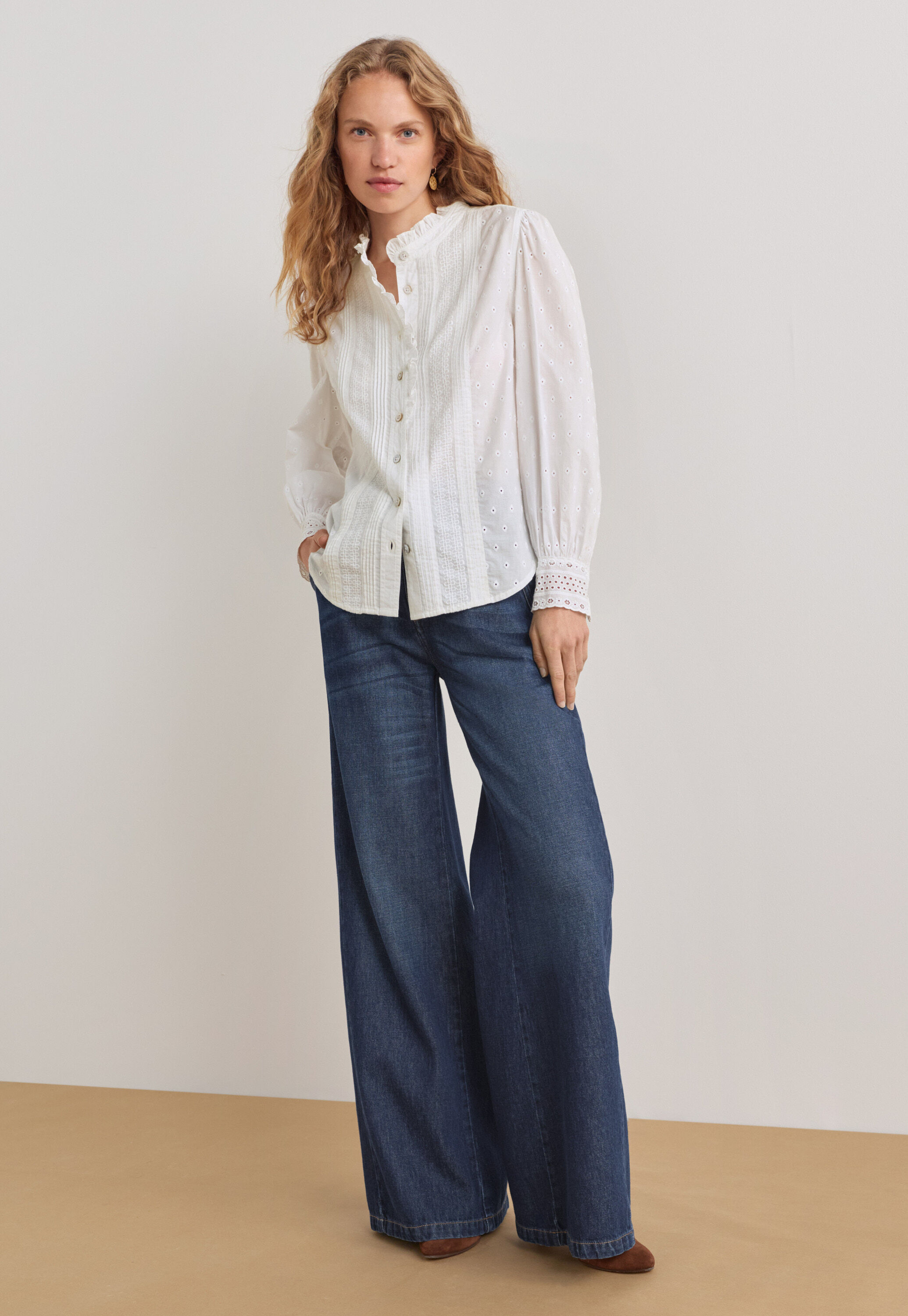 Ruffle-neck broderie blouse