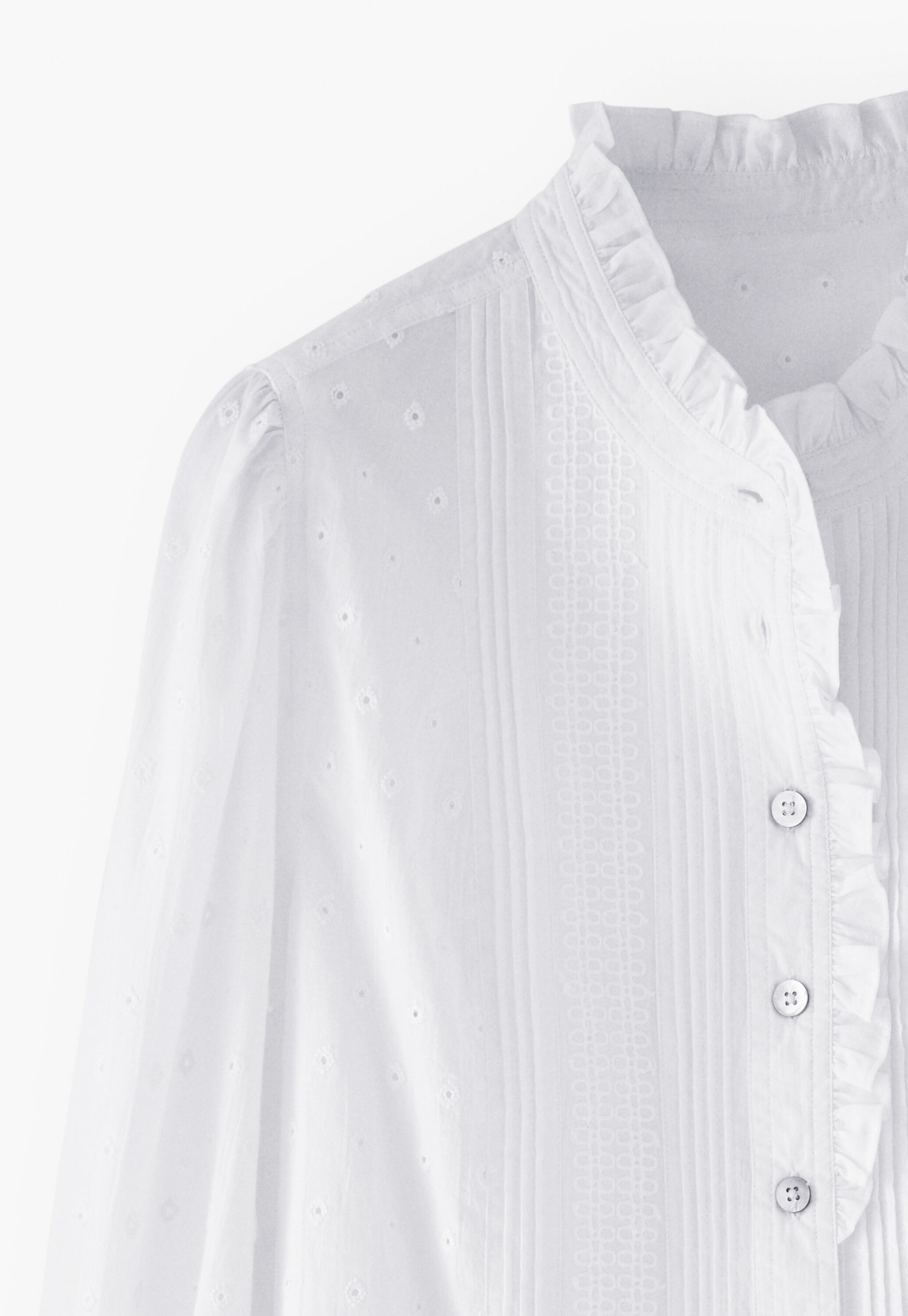 Ruffle-neck broderie blouse