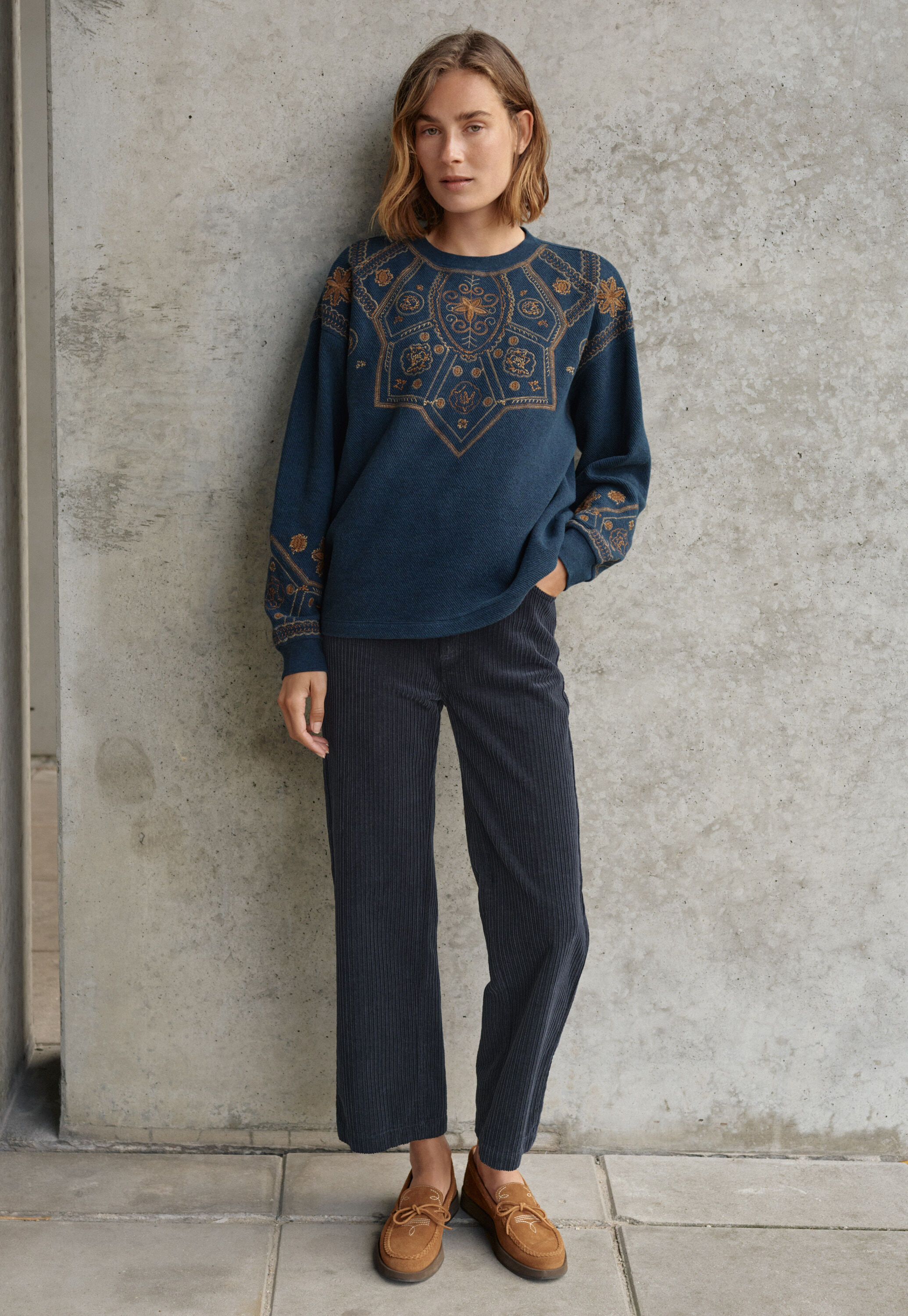 Cropped cord trousers