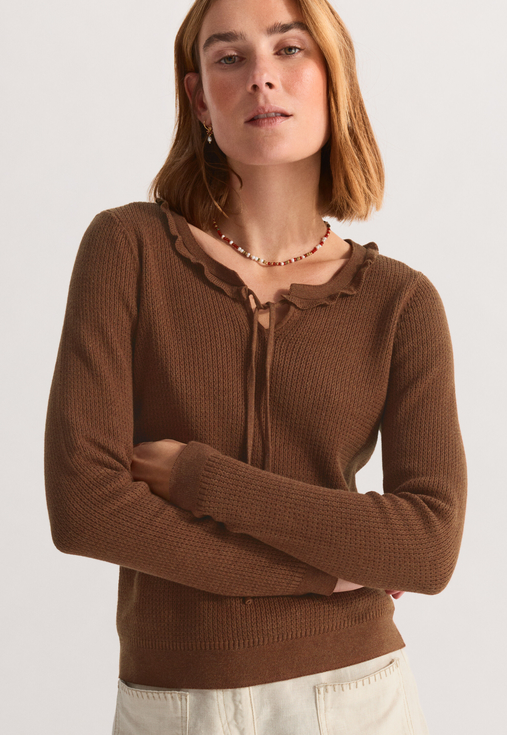 Tie-front tuck-stitch sweater