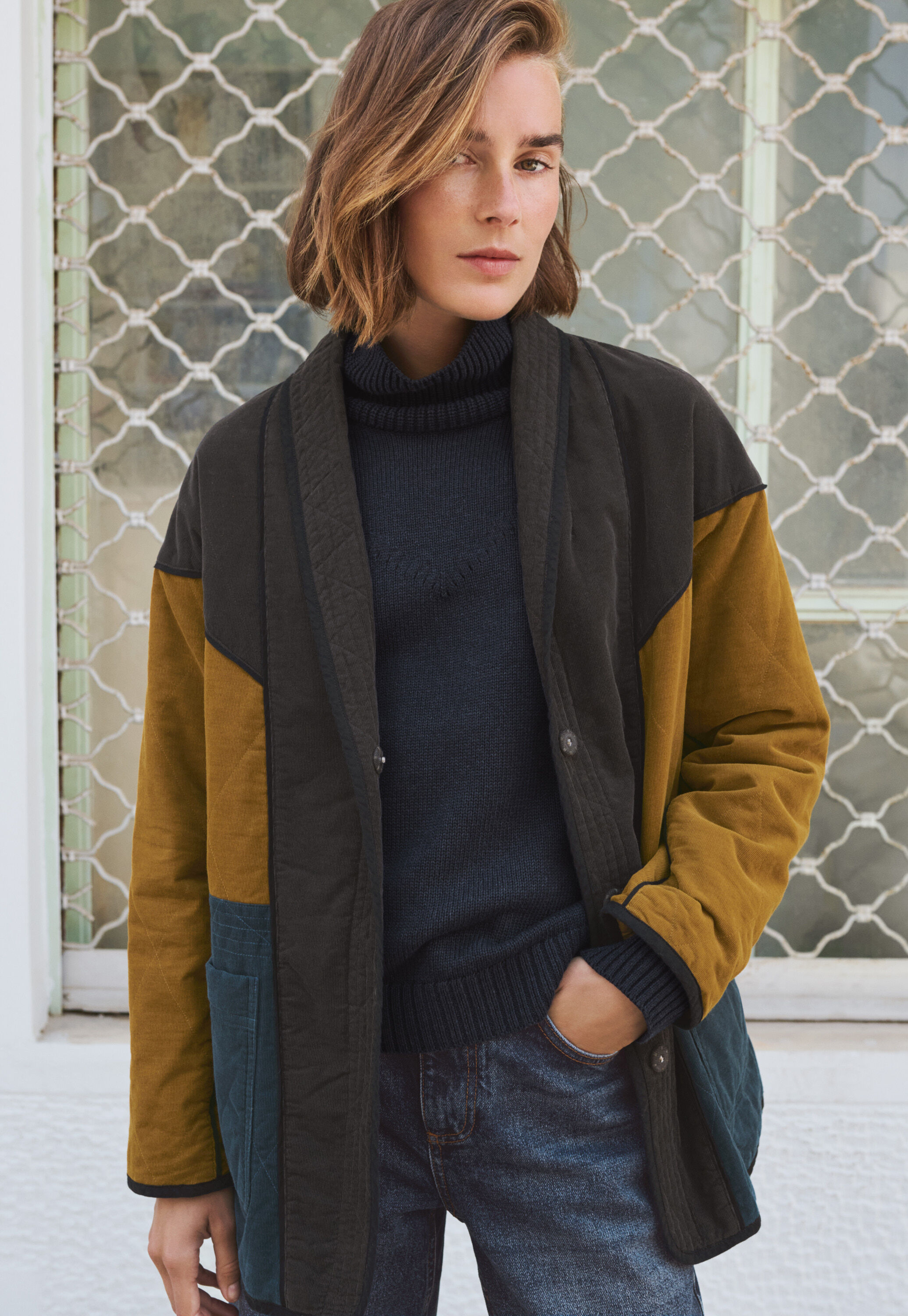 Panelled cord coat