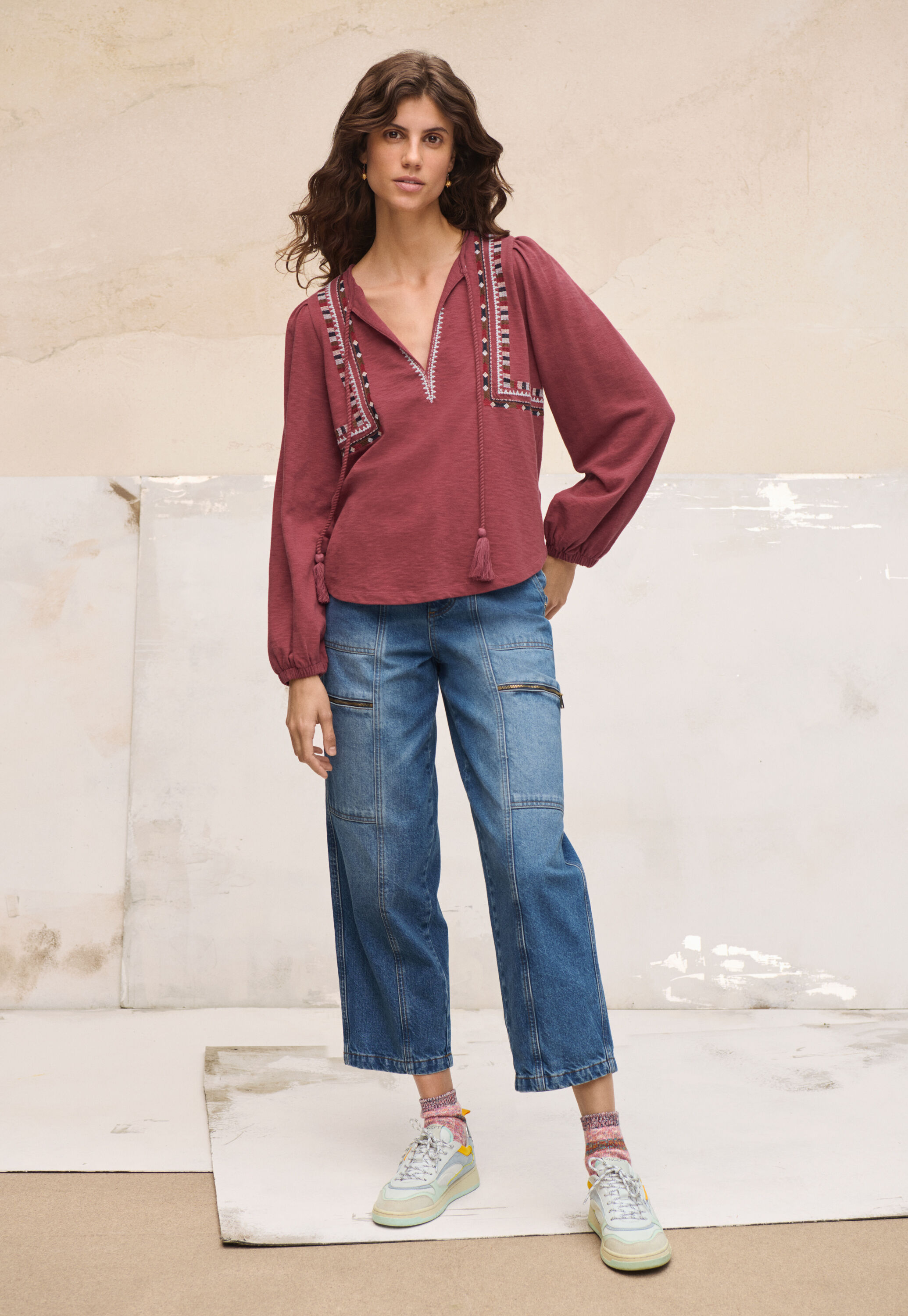 Embroidered tie-neck top