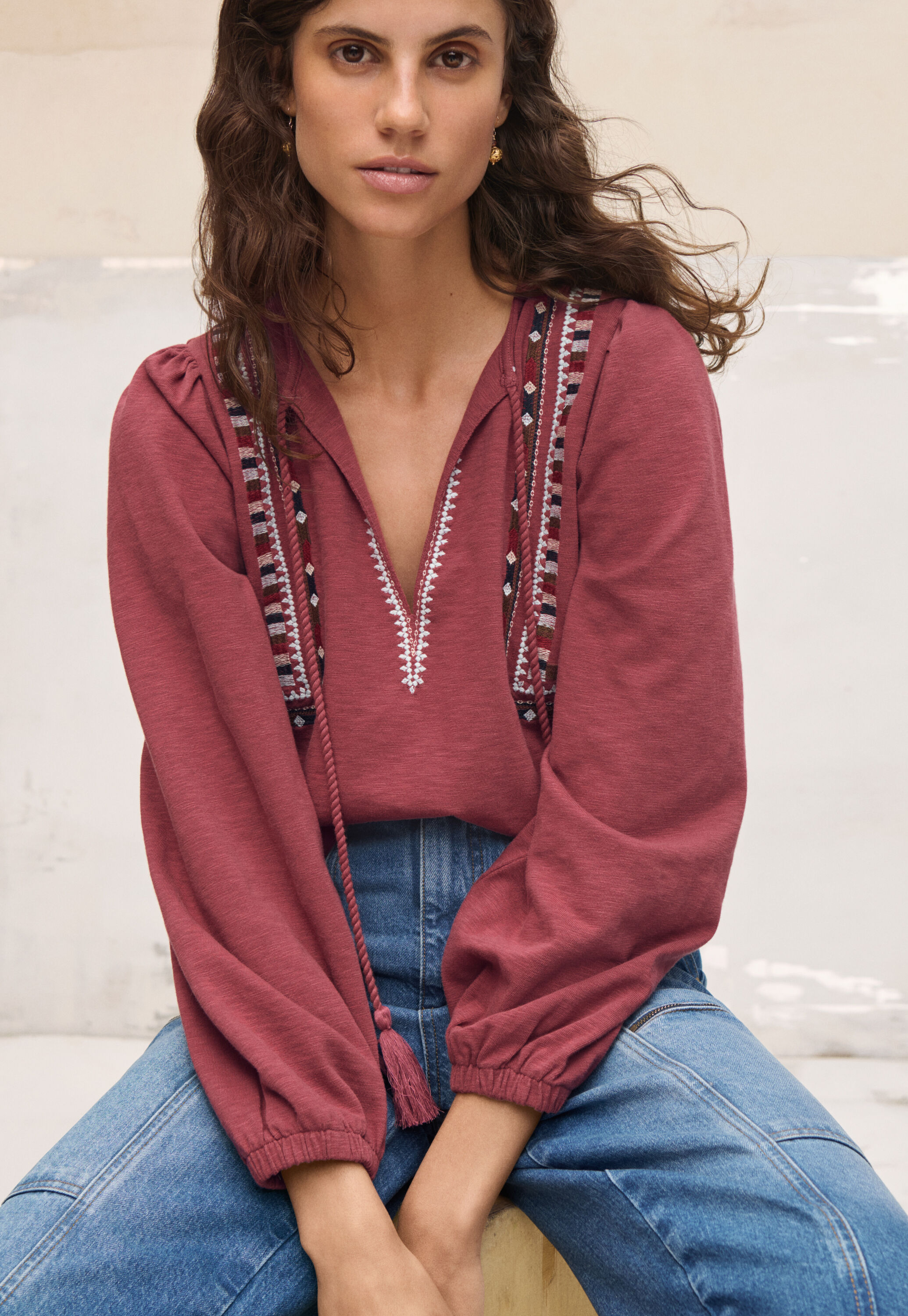 Embroidered tie-neck top