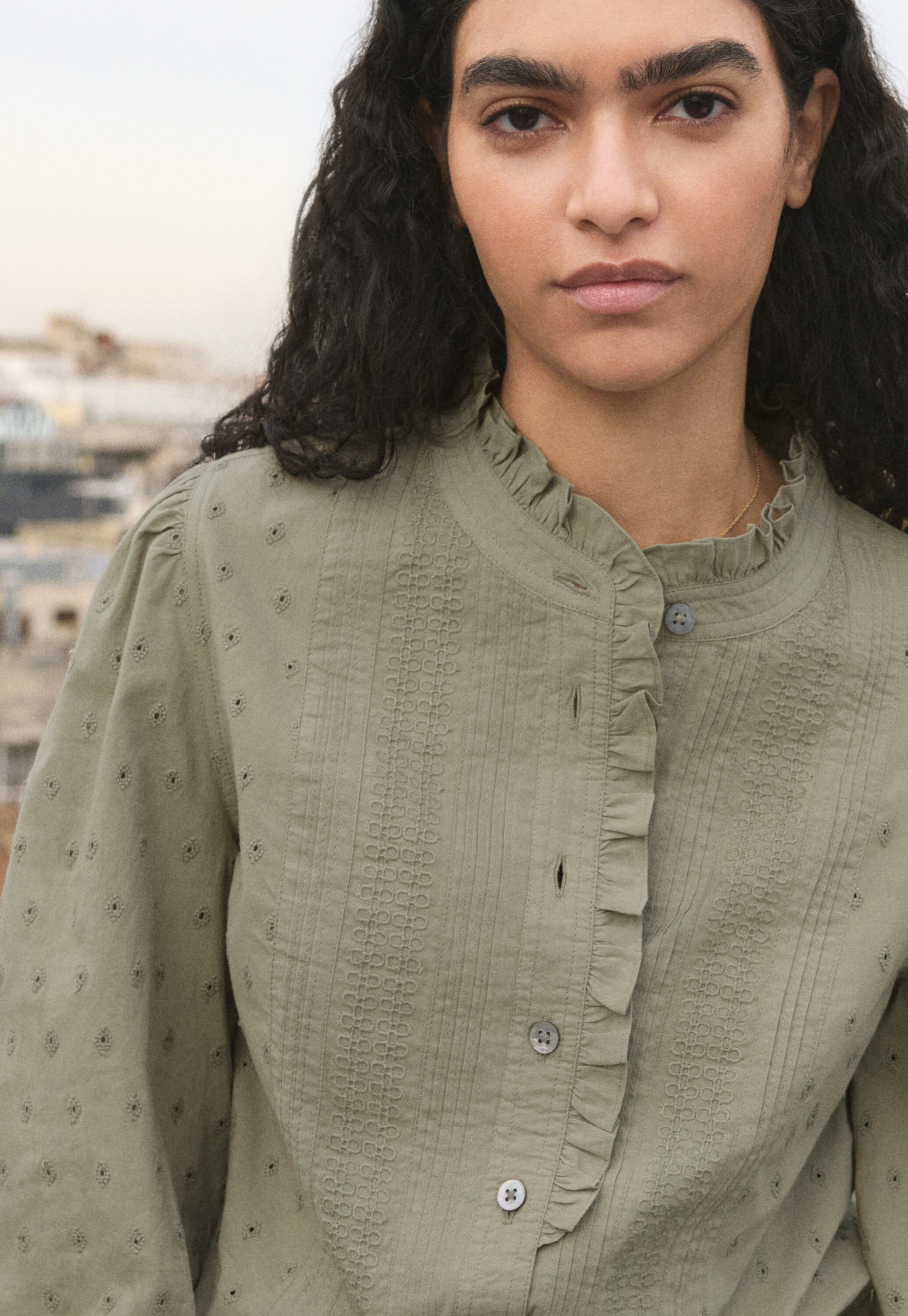 Ruffle-neck broderie blouse
