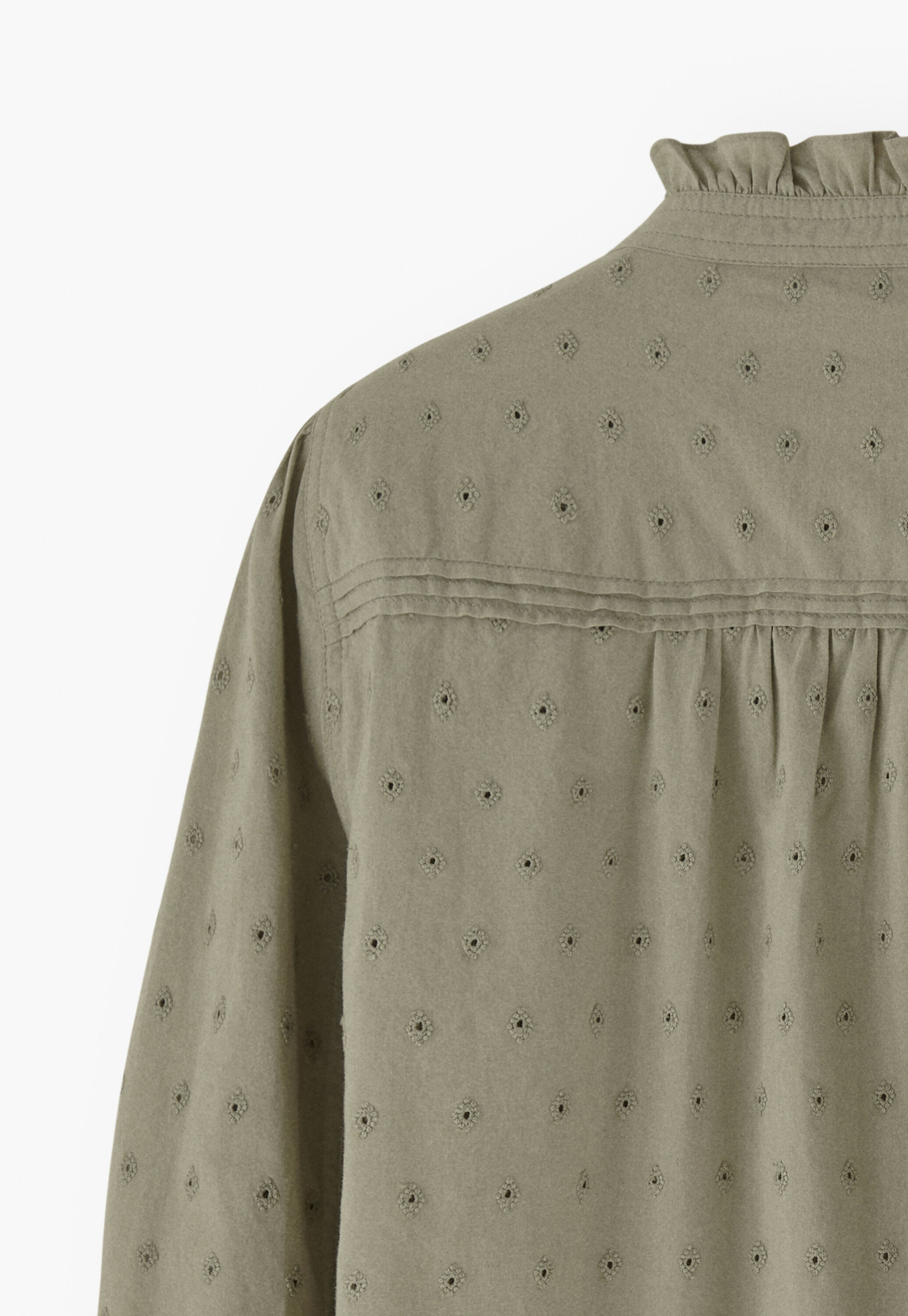 Ruffle-neck broderie blouse
