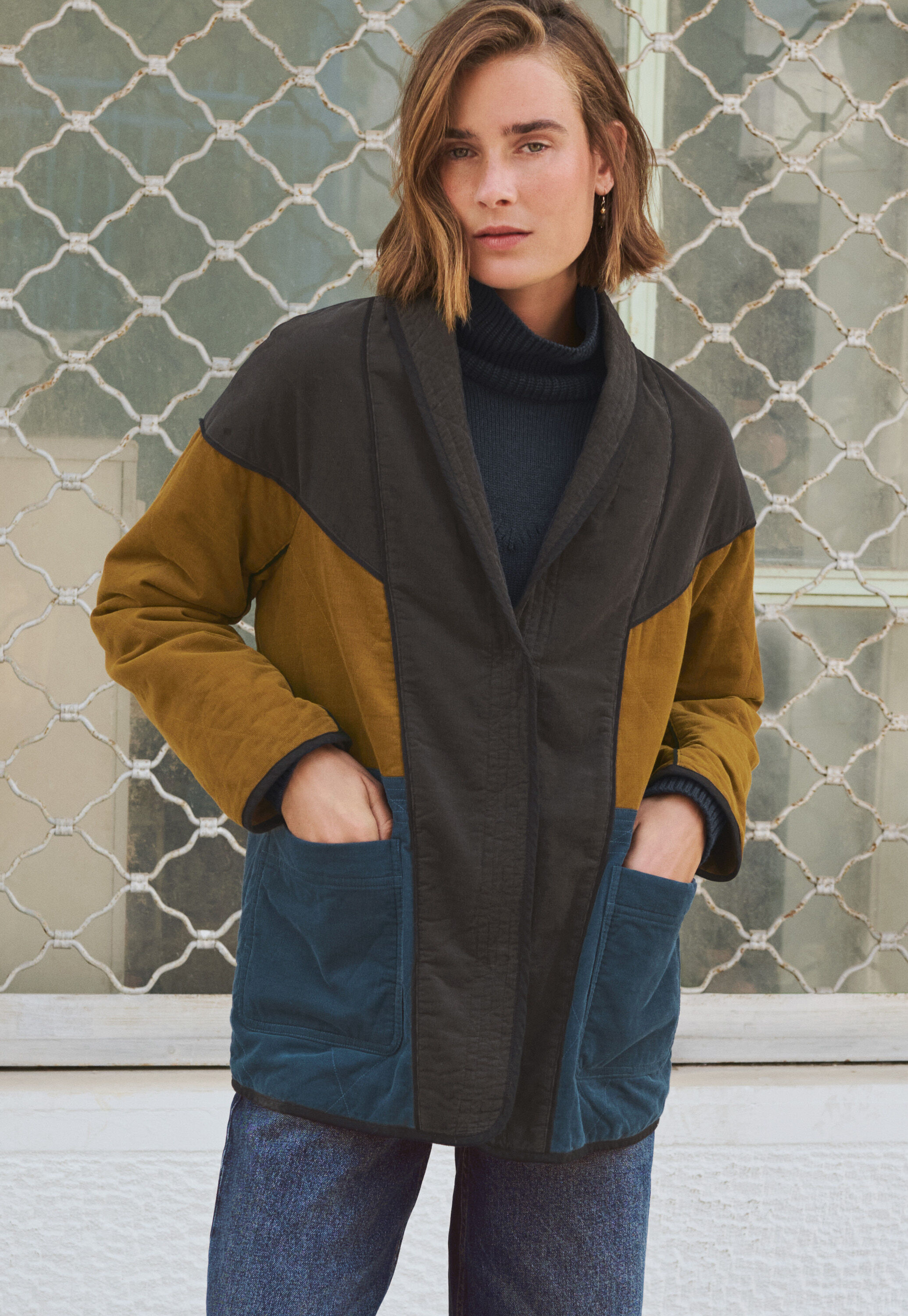 Panelled cord coat