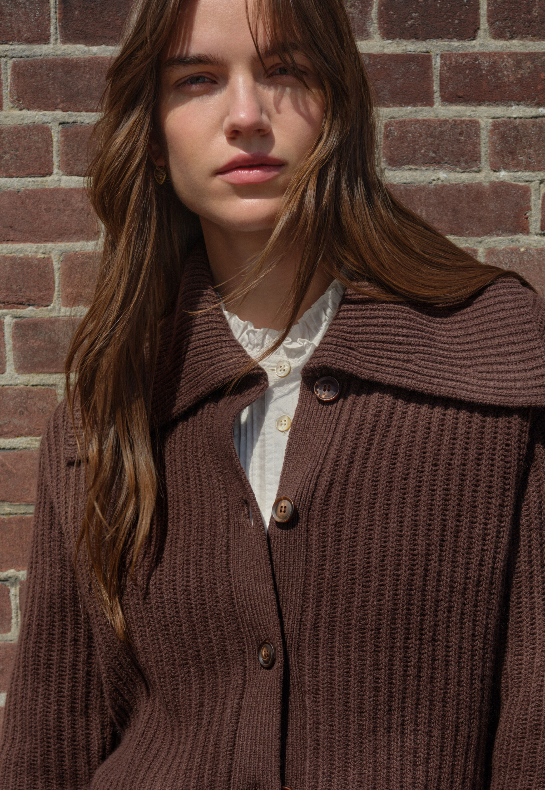 Sleeveless checked jacket