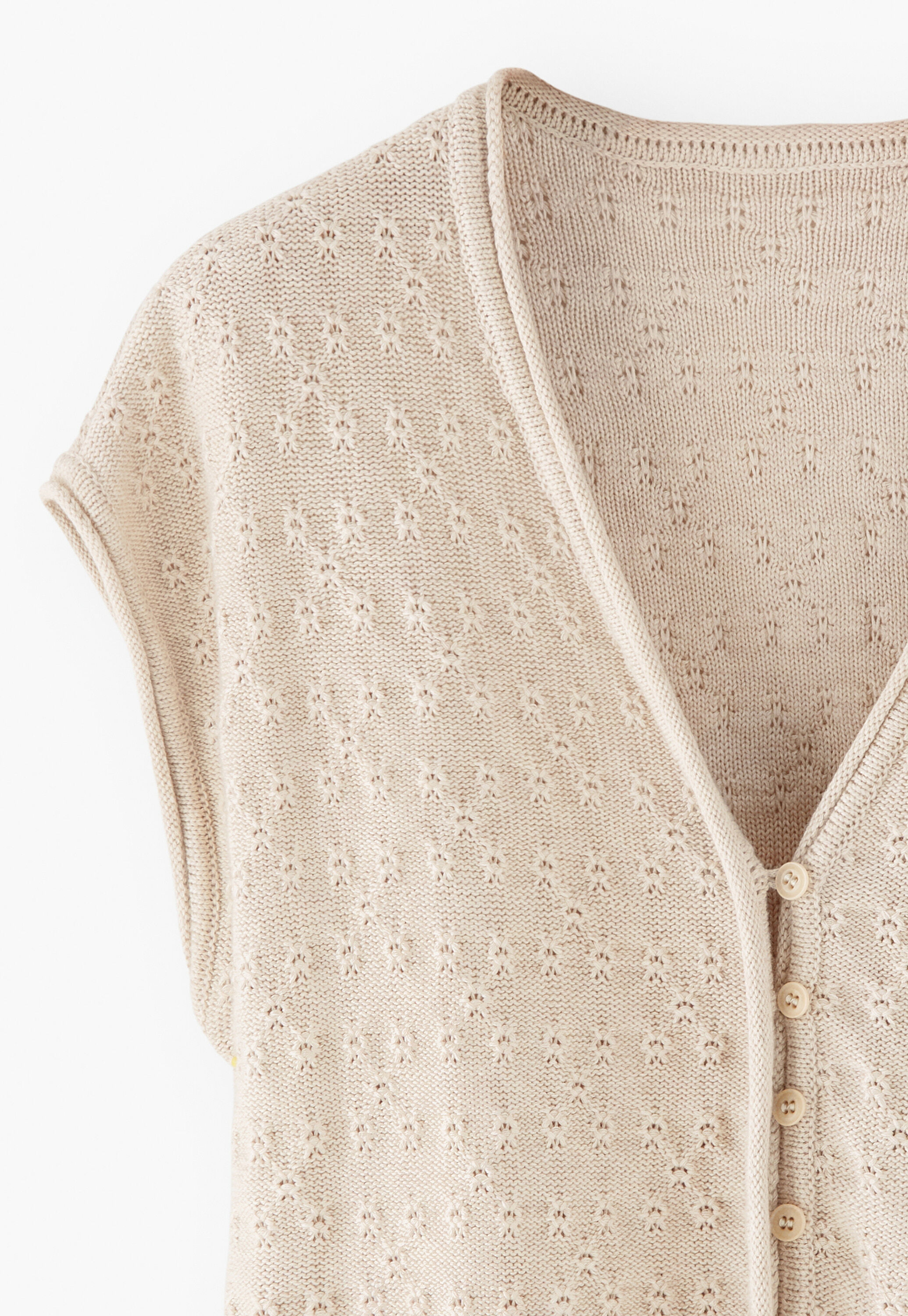 Sleeveless tuck-stitch cardigan